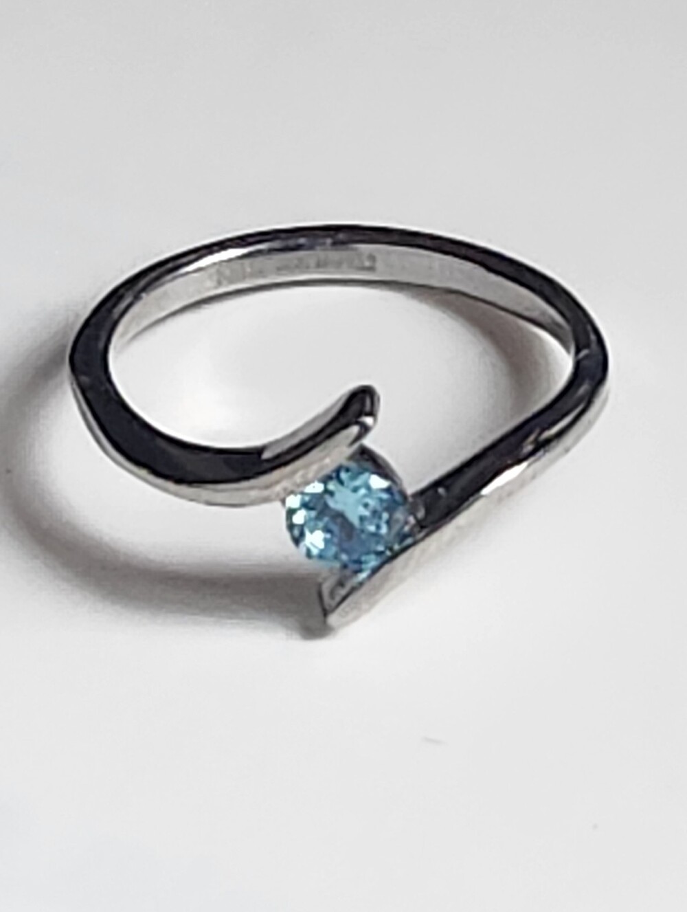 Stainless Steel Silver Tone Blue Topaz Wave Bypass Ring - Size 5